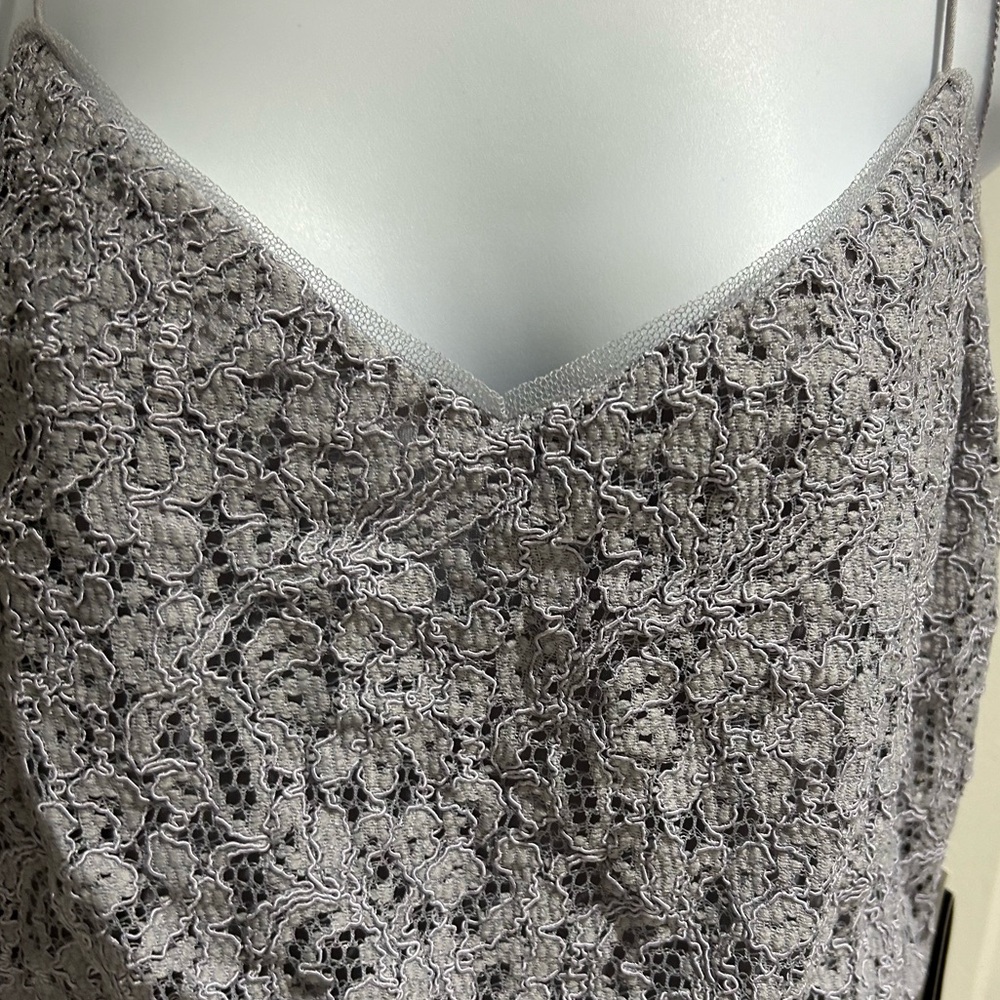 New with tags Long gown, color. Periwinkle color.